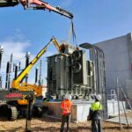Grutage transformateur de puissance sur bacs de r&eacute;tention SANERGRID ERT MODULO3