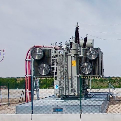 View of a power transformer installation with a custom-made Sanergrid fire-retardant containment pit and access staircase